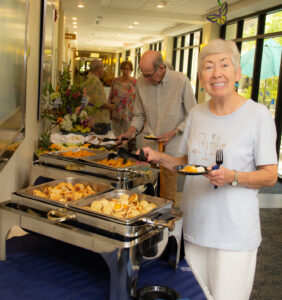 buena vida residents enjoying a buffet