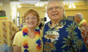 smiling couple with a positive aging mindset