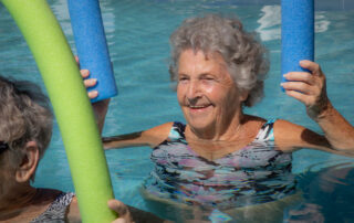 resident enjoying our pool activities at buena vida estates