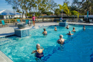 buena vida estates residents enjoying a water exercise class