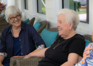 residents laughing together and enjoying retirement