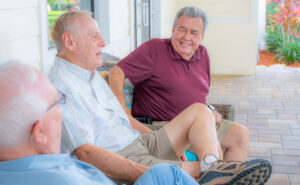 retirement community residents smiling with friends