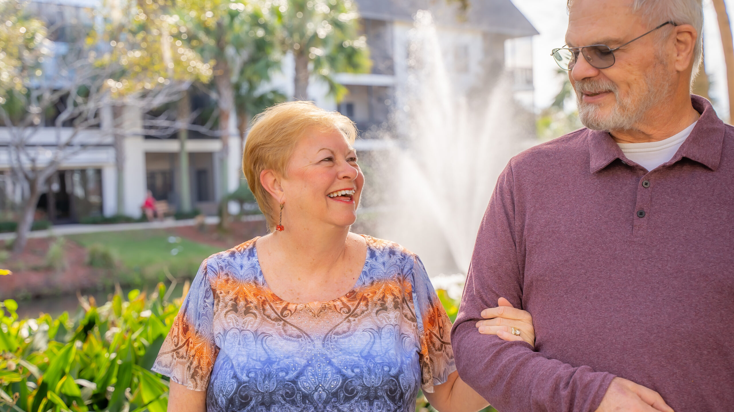 happy buena vida residents walking outside