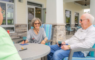 smiling senior residents at clubhouse