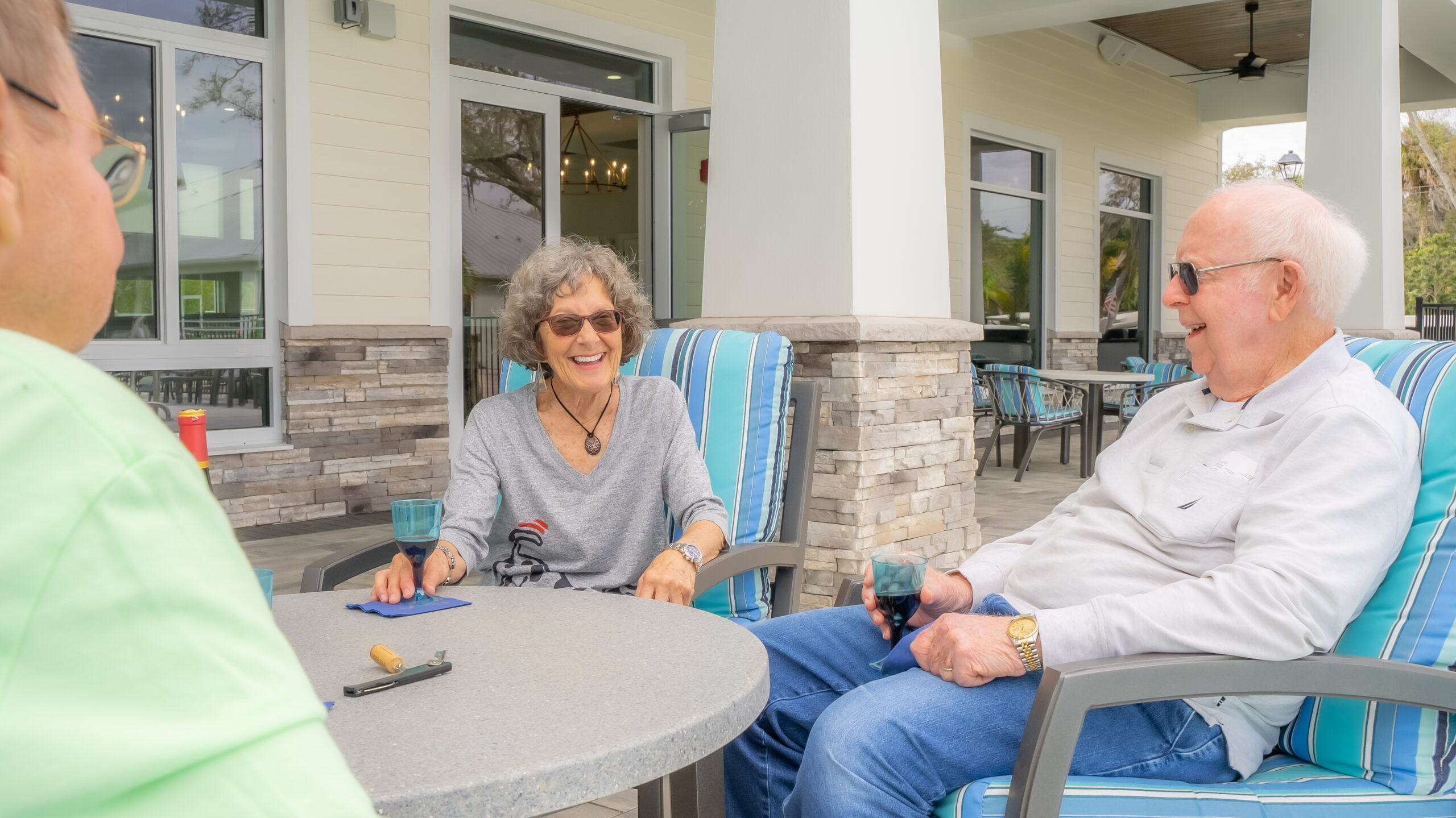 smiling senior residents at clubhouse